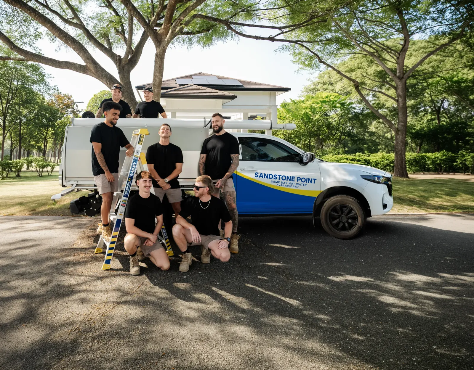 Sandstone Point Same Day Hot Water team and ute